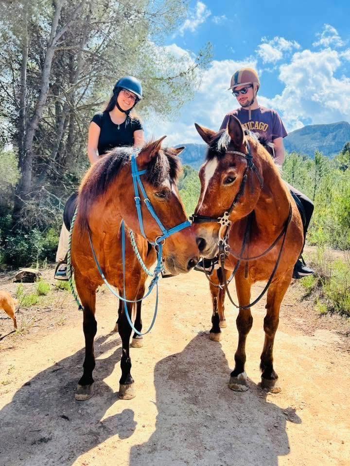 Two riders on a countryside trail near Calpe